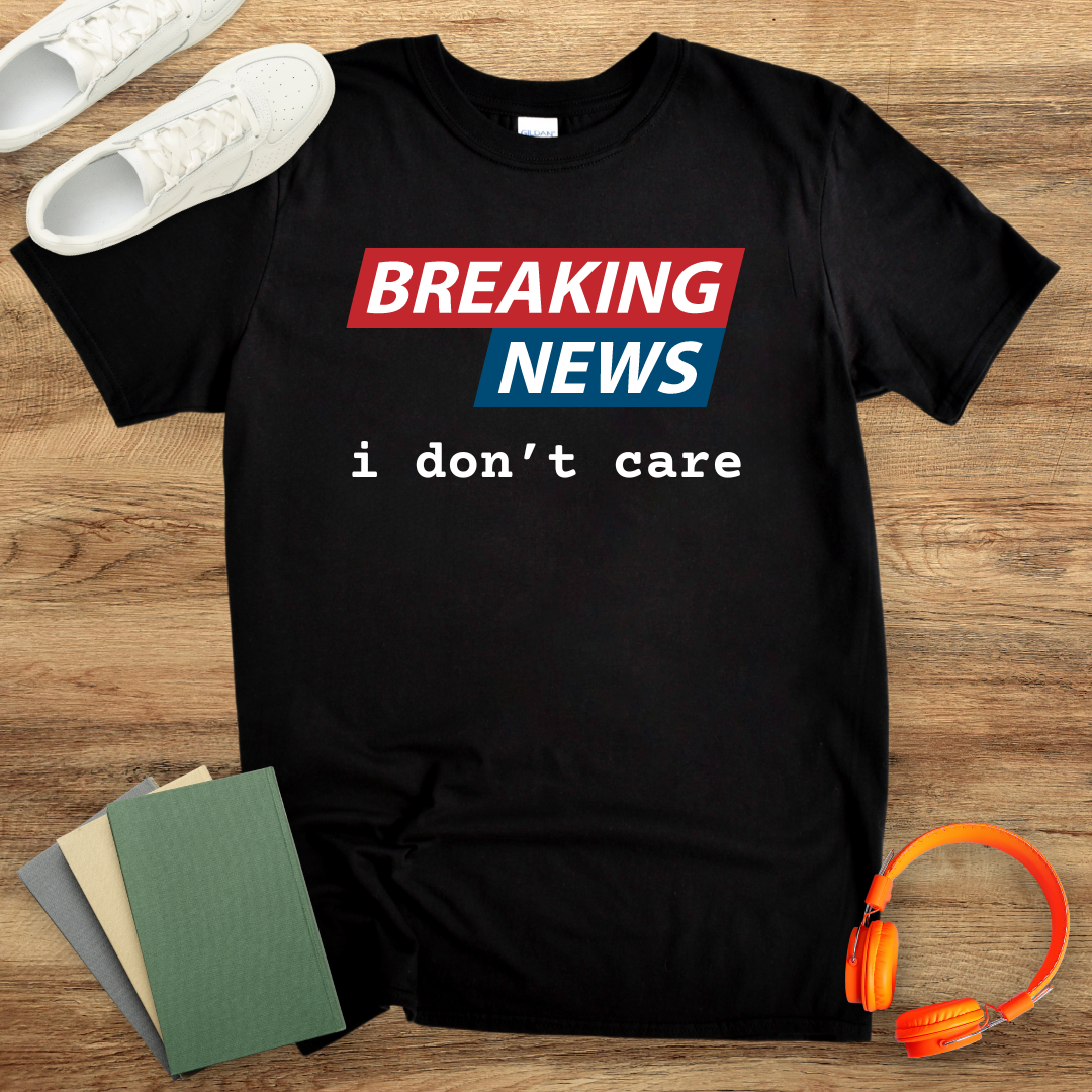 Breaking News I Don't Care Unisex Softstyle T-Shirt