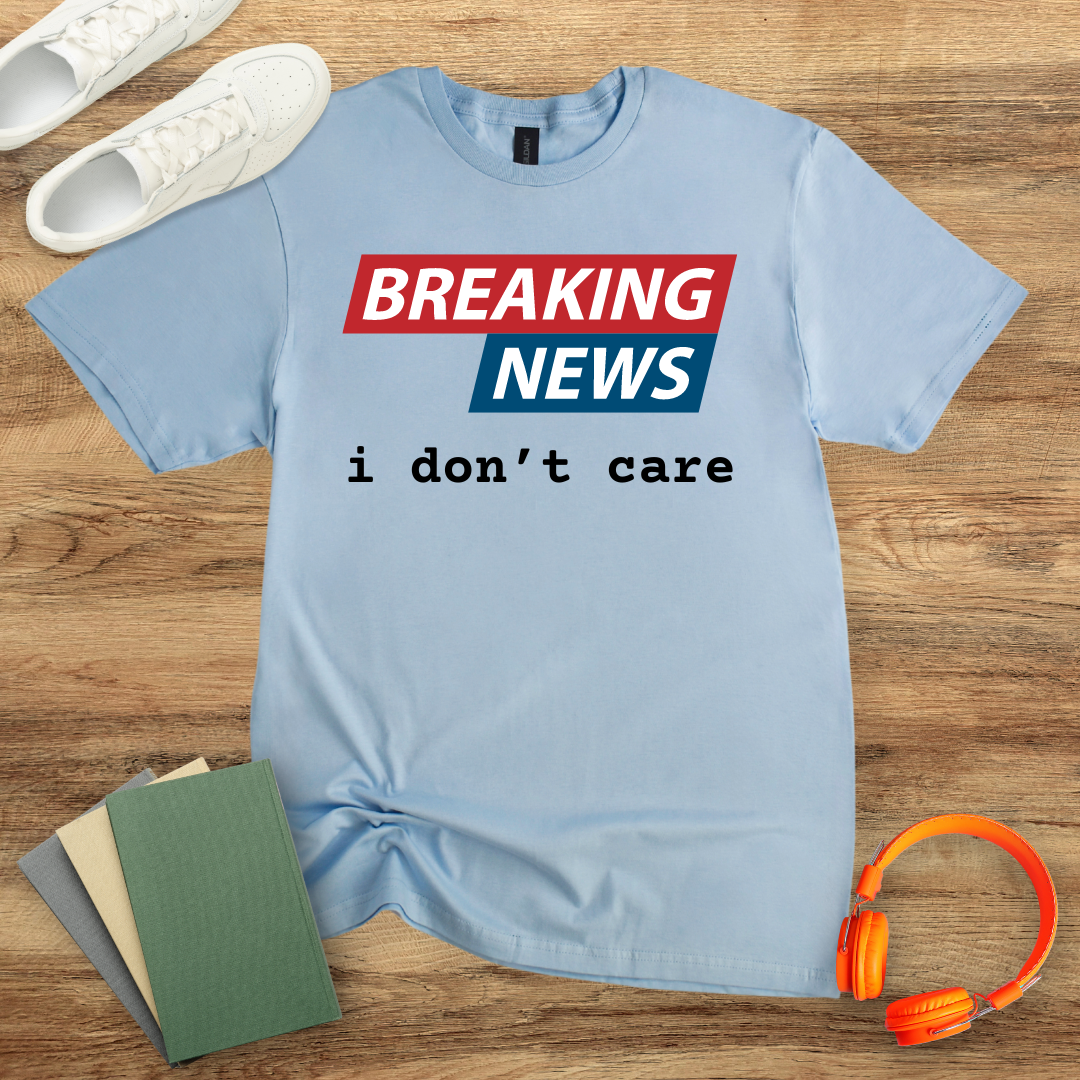 Breaking News I Don't Care Unisex Softstyle T-Shirt